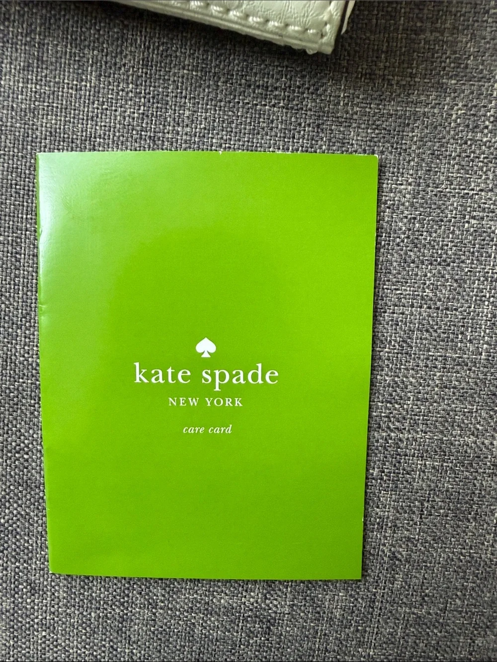 kate spade White and Green Palm Leaf Wristlet Clutch